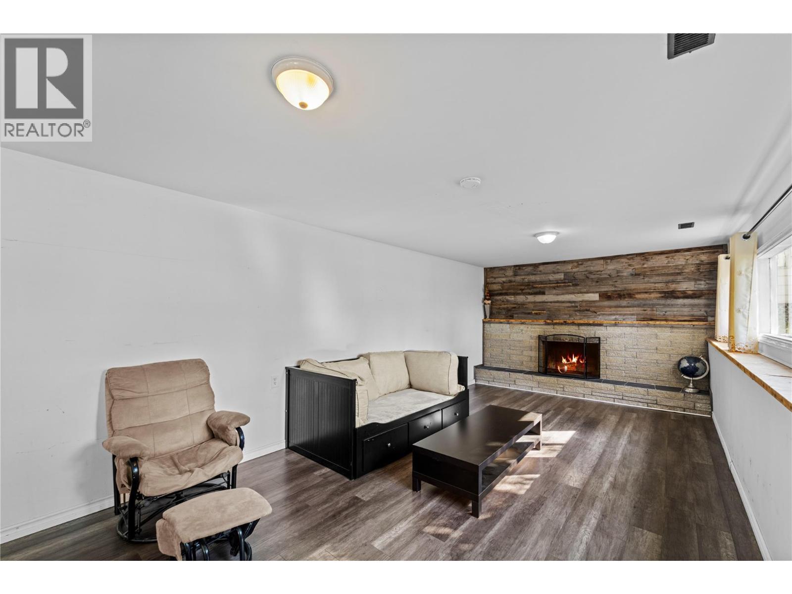 1938 Parker Drive, Merritt, BC - Indoor Photo Showing Other Room With Fireplace
