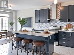 Virtually staged kitchen and breakfast area -