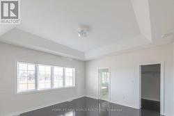 primary bedroom with w/i closet an 5 pc ensuite -