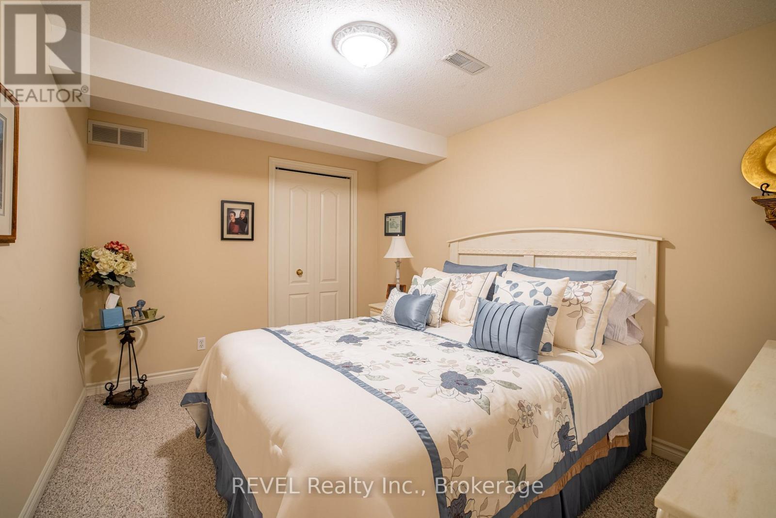 23 - 1439 Niagara Stone Road, Niagara-On-The-Lake (Virgil), ON - Indoor Photo Showing Bedroom