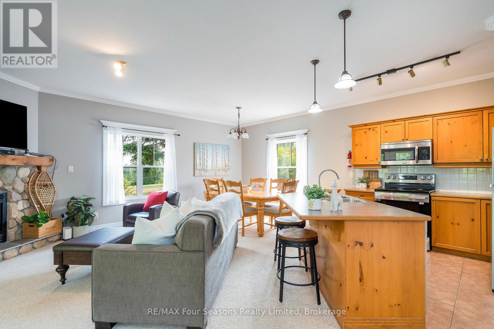 114 - 184 Snowbridge Way, Blue Mountains, ON - Indoor With Fireplace