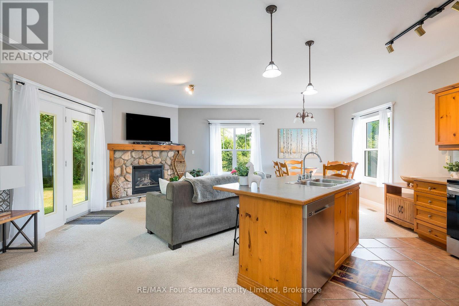 114 - 184 Snowbridge Way, Blue Mountains, ON - Indoor Photo Showing Other Room With Fireplace