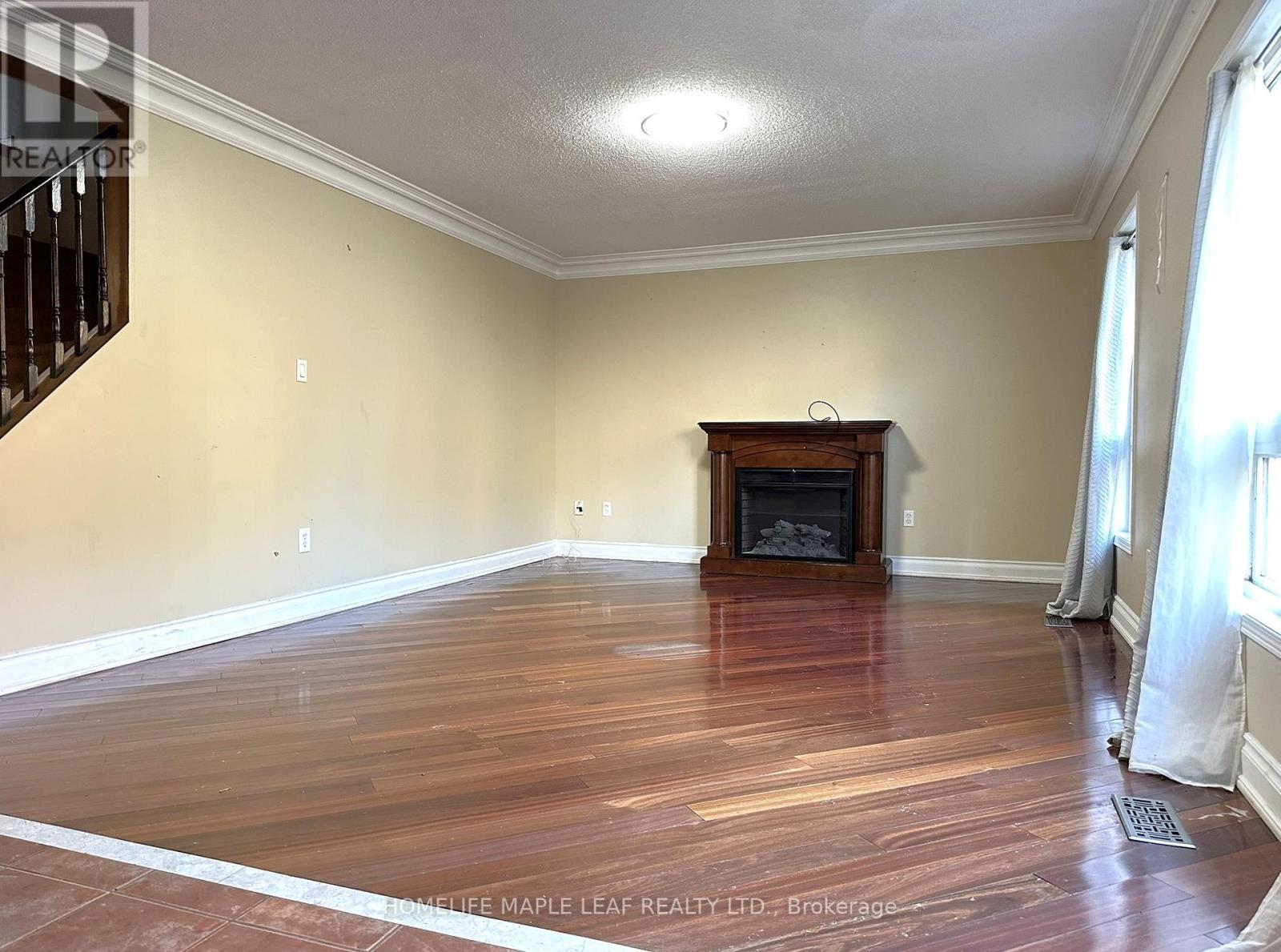 (Main Floor) - 72 Four Seasons Circle, Brampton, ON - Indoor With Fireplace