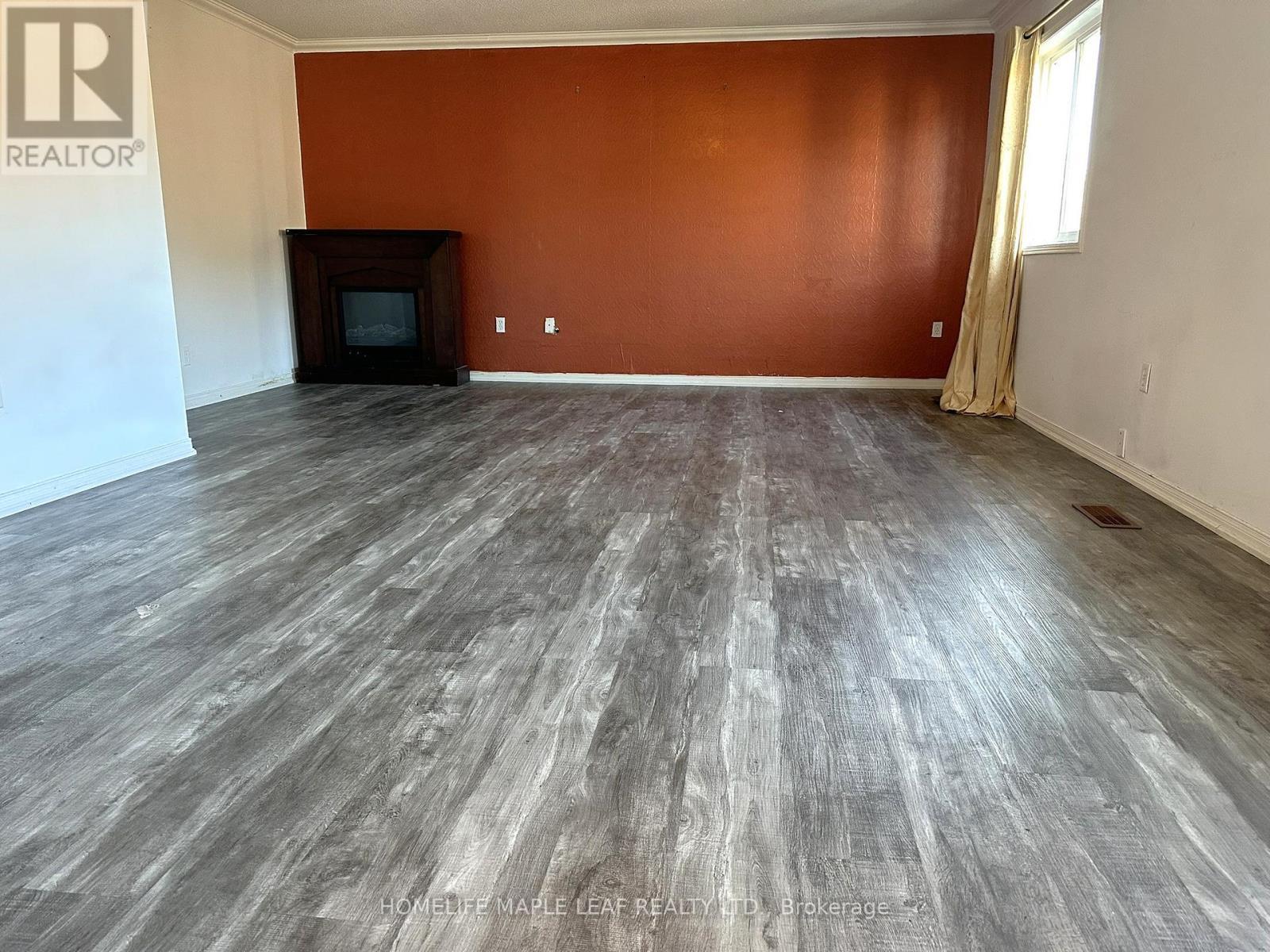 (Main Floor) - 72 Four Seasons Circle, Brampton, ON - Indoor With Fireplace