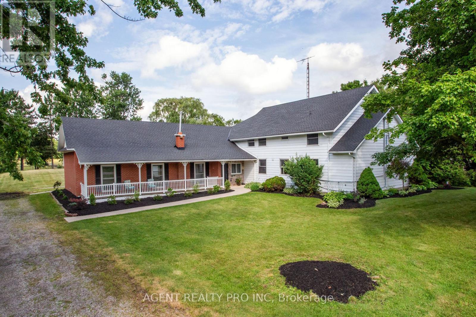 24264 Coldstream Road, Middlesex Centre, ON - Outdoor With Deck Patio Veranda