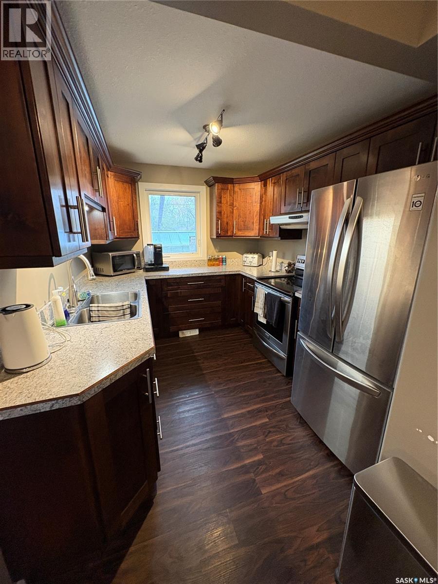 230 Prothero Avenue E, Churchbridge, SK - Indoor Photo Showing Kitchen With Double Sink