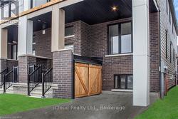 Convenient storage behind cedar gates -