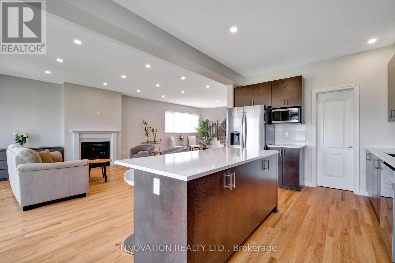 868 Snowdrop Crescent, Ottawa, ON - Indoor Photo Showing Kitchen With Fireplace With Upgraded Kitchen
