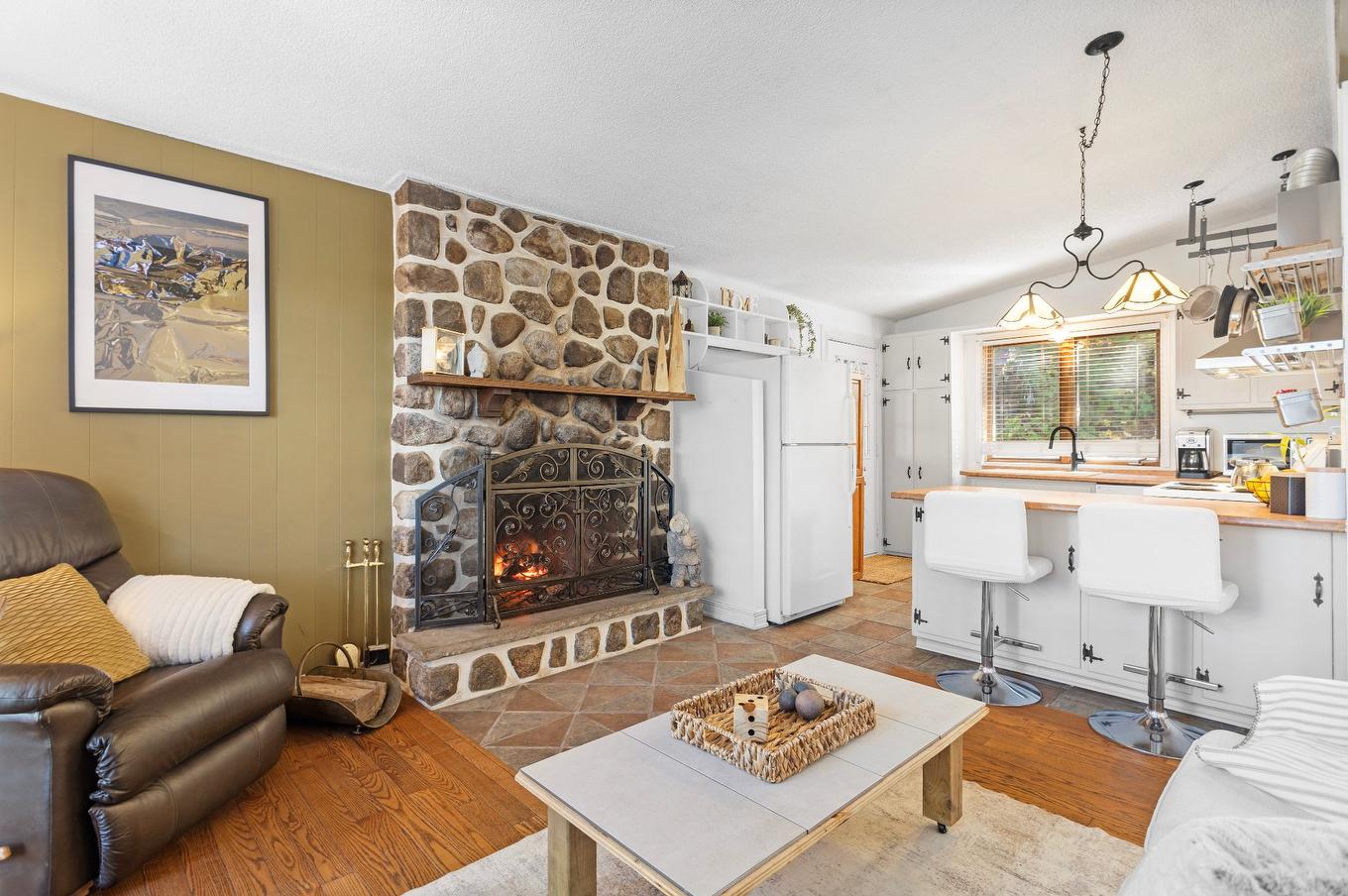 Living room - 344 Rue Des Hêtres, Val-Morin, QC - Indoor Photo Showing Living Room With Fireplace