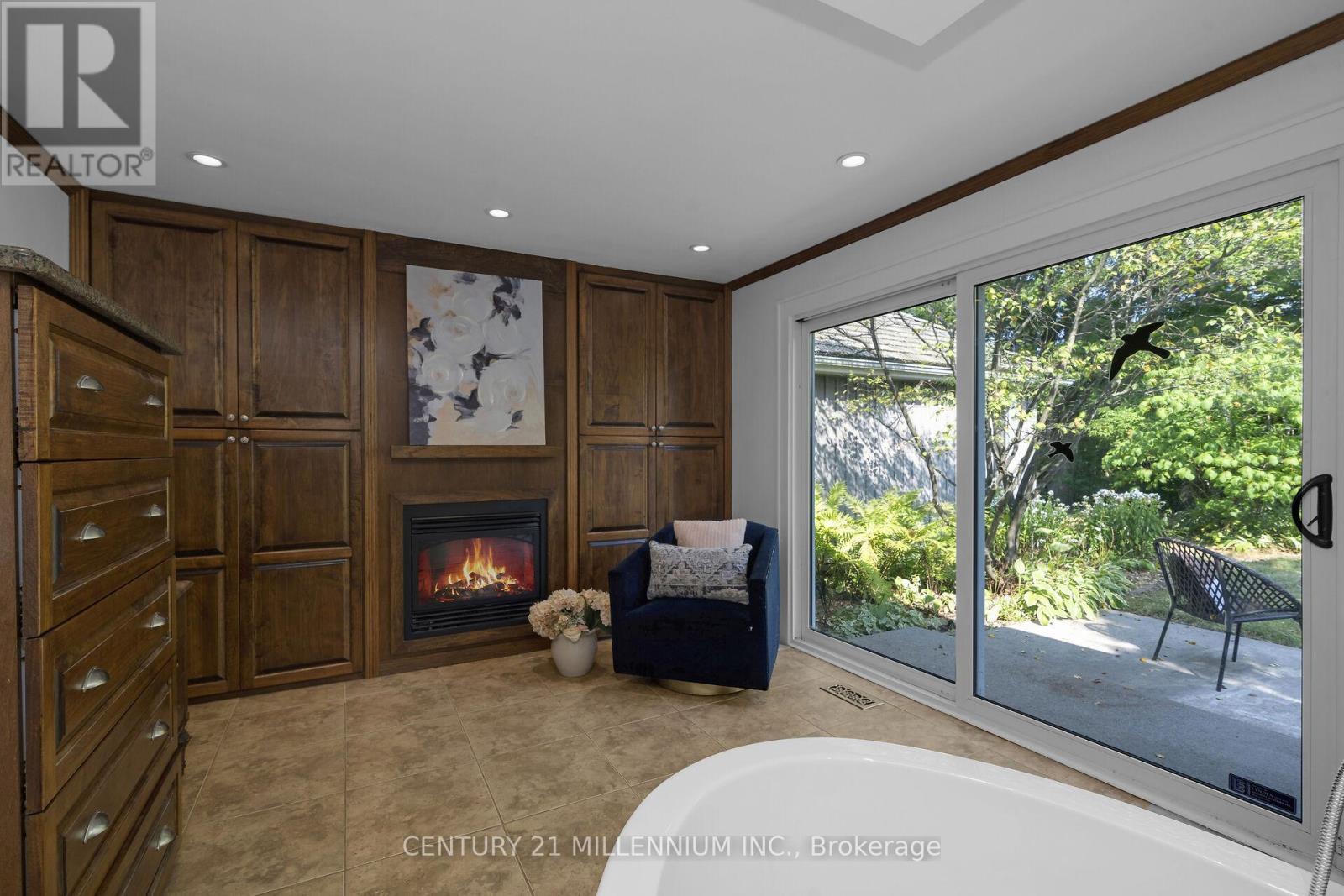 Private deck off ensuite bathroom - 5136 Fifth Line, Erin, ON - Indoor With Fireplace