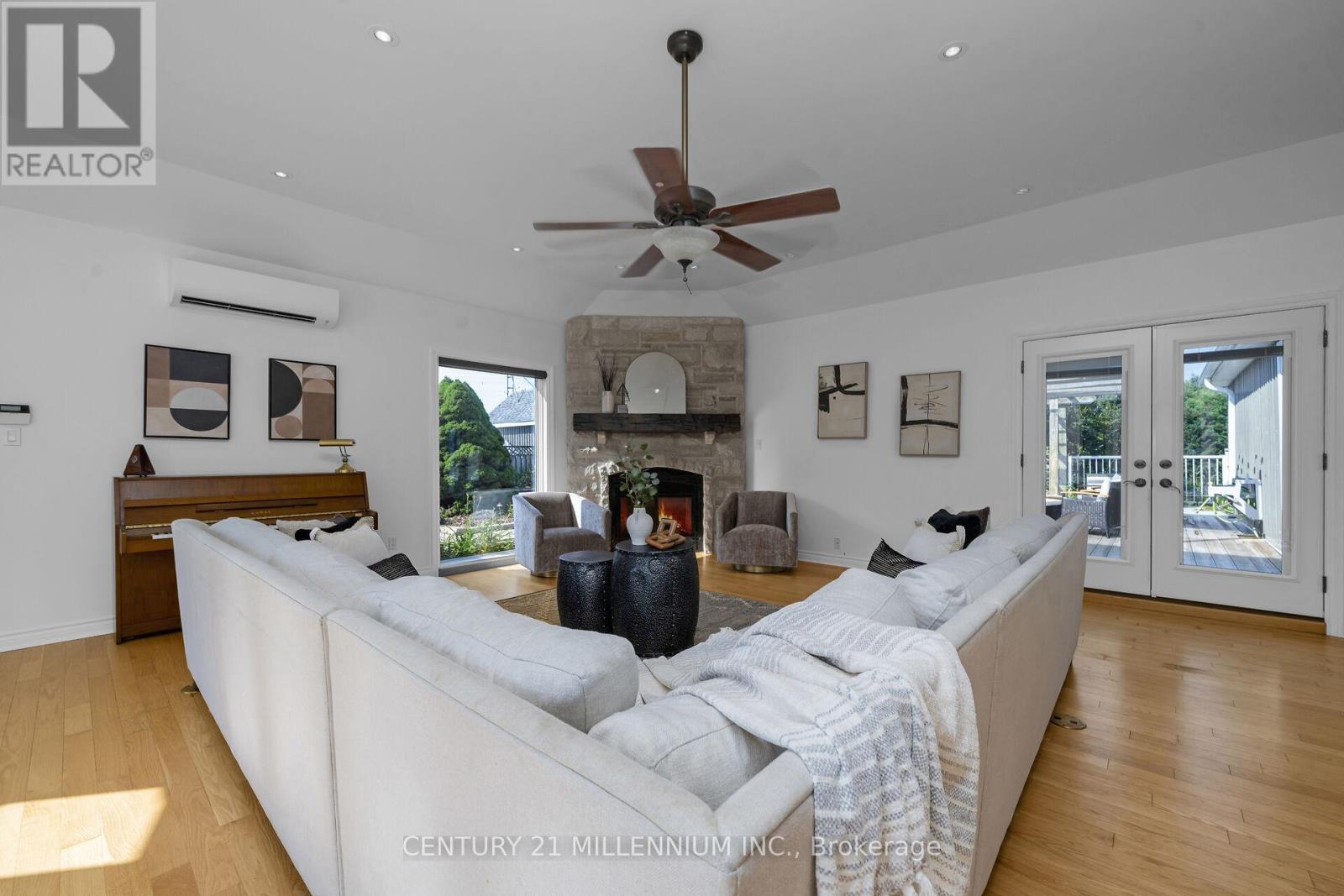 Overlooking pool and front yard - 5136 Fifth Line, Erin, ON - Indoor With Fireplace