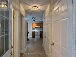 Then into the foyer with closets and laundry. -