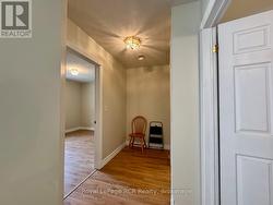 Hallway to bedrooms & bathroom area. -