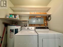 Laundry room with shelving. -