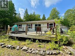 Raised deck offer level walk out from living room. -