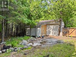 Double car garage & separate garden shed. -