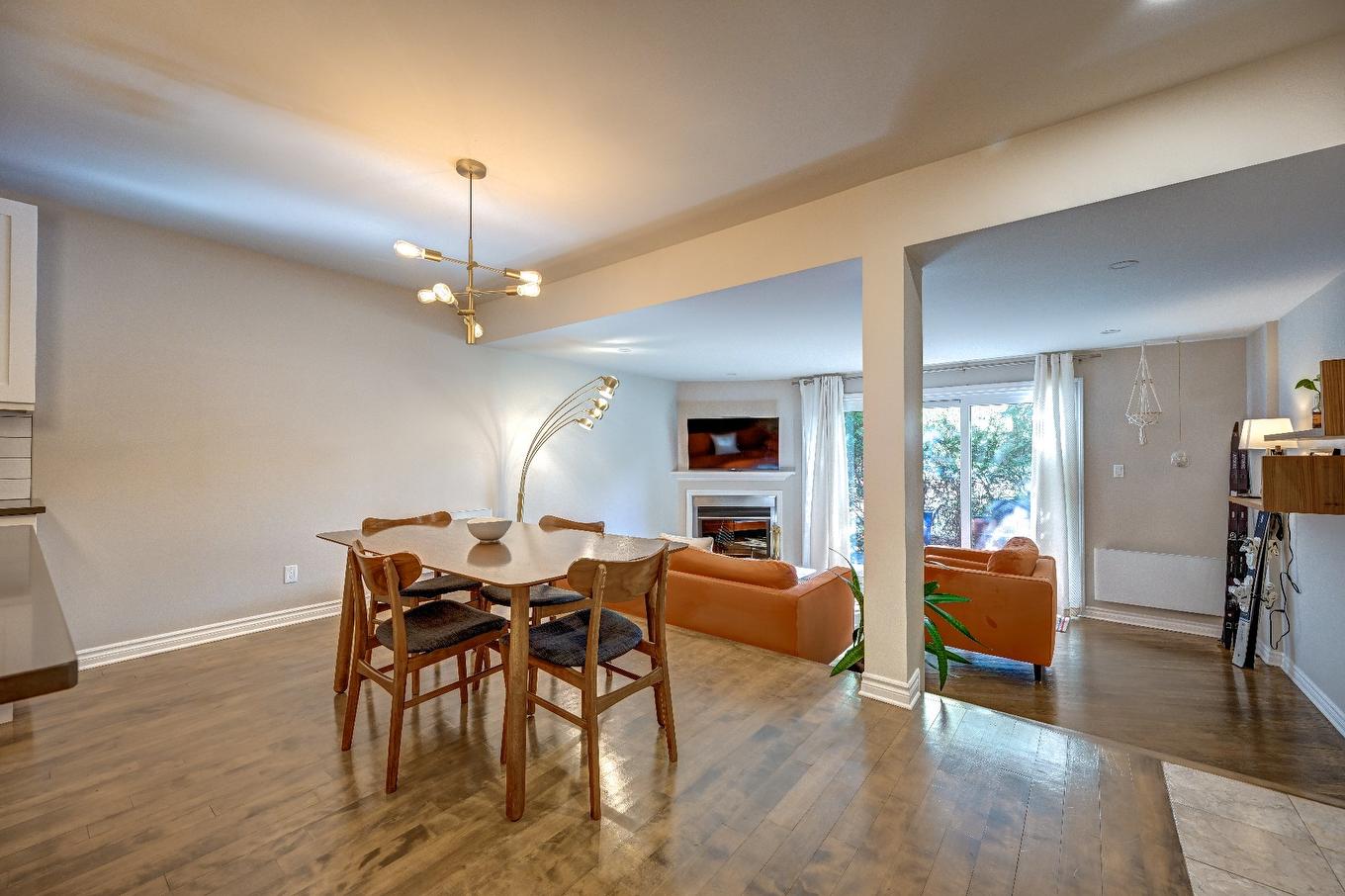 Salle à manger - A-179 Av. De Navarre, Saint-Lambert, QC - Indoor Photo Showing Other Room With Fireplace