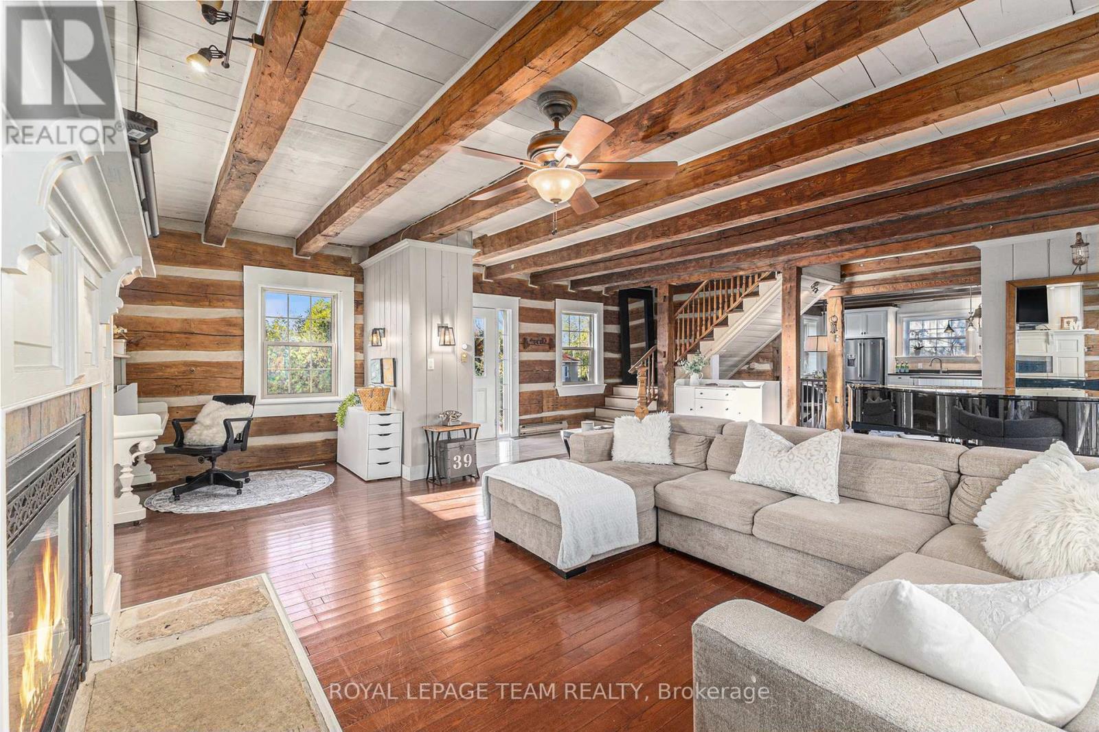 140 Creek Drive, Ottawa, ON - Indoor Photo Showing Living Room With Fireplace