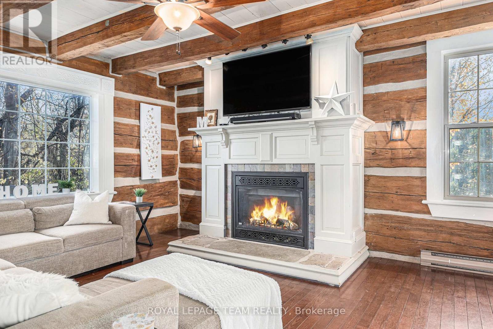 140 Creek Drive, Ottawa, ON - Indoor Photo Showing Living Room With Fireplace