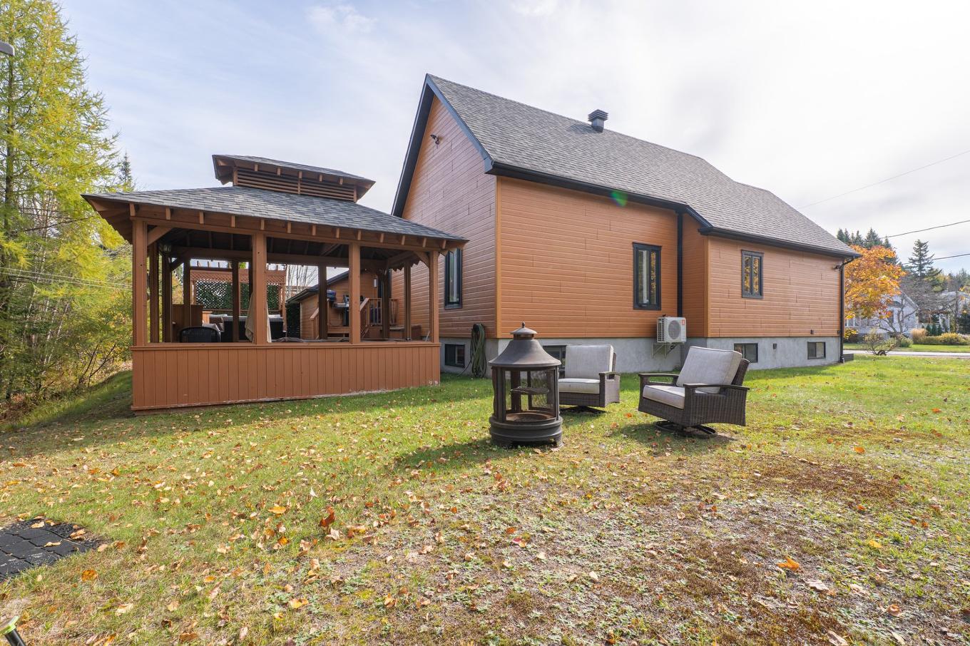 Face arrière - 513 Rue Des Sous-Bois, Sainte-Agathe-Des-Monts, QC - Outdoor With Deck Patio Veranda With Exterior