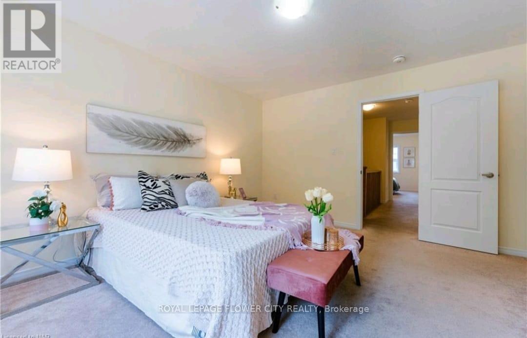 Primary Bedroom - 3 - 8273 Tulip Tree Drive N, Niagara Falls, ON - Indoor Photo Showing Bedroom