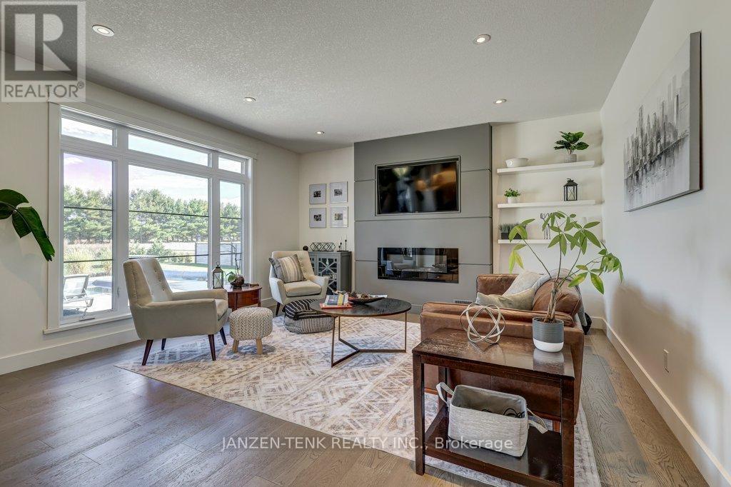 8476 Imperial Road S, Malahide, ON - Indoor Photo Showing Living Room With Fireplace