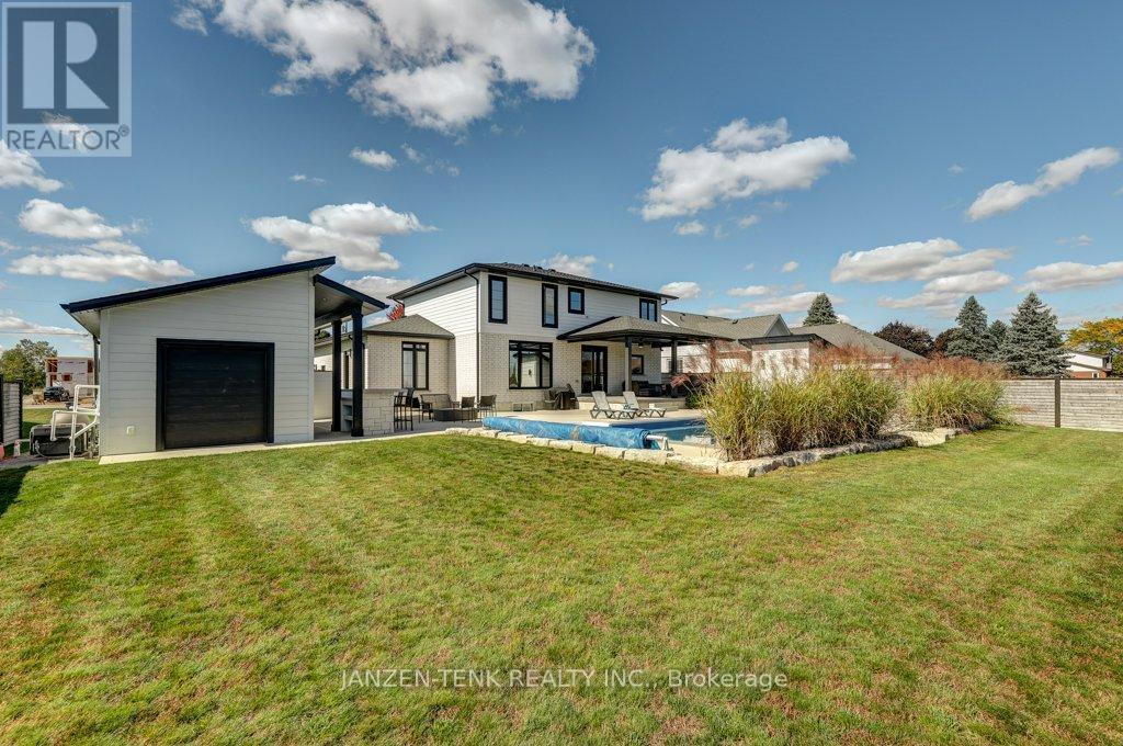 8476 Imperial Road S, Malahide, ON - Outdoor With In Ground Pool