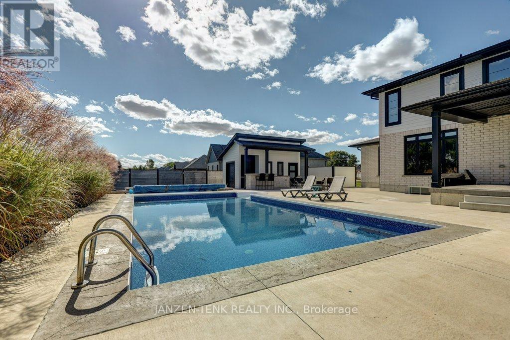 8476 Imperial Road S, Malahide, ON - Outdoor With In Ground Pool