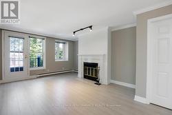 Living Room with Wood Burning Fireplace -