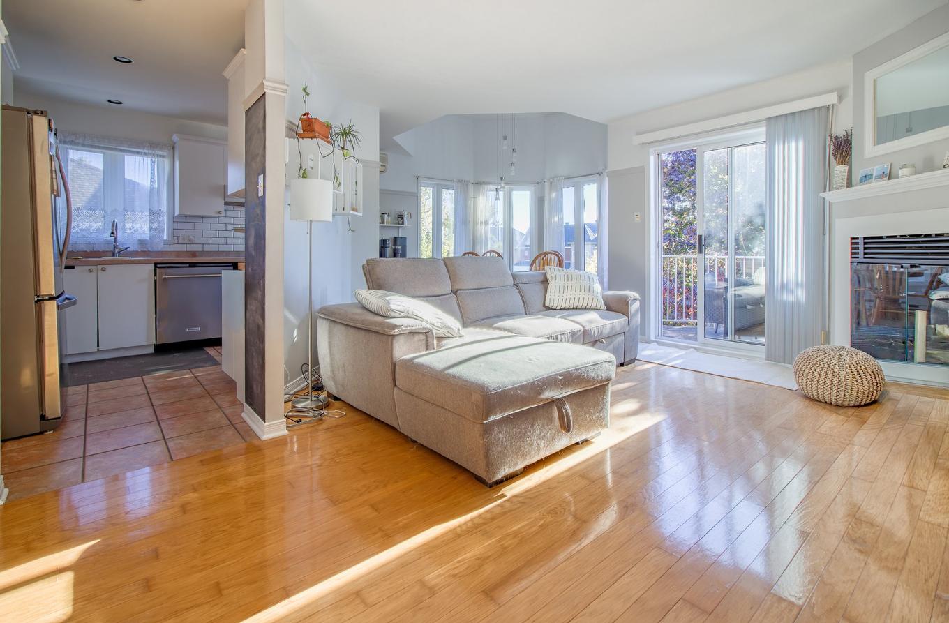 Overall view - 6-545 Rue Jérôme-Richer, Saint-Eustache, QC - Indoor Photo Showing Living Room With Fireplace