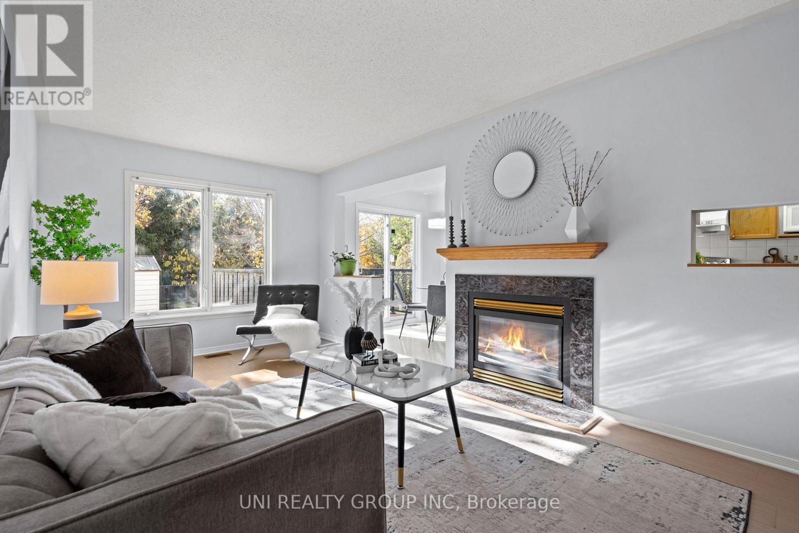 1720 Jobin Crescent, Ottawa, ON - Indoor Photo Showing Living Room With Fireplace