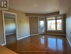 Living Room and Balcony Access Door. -