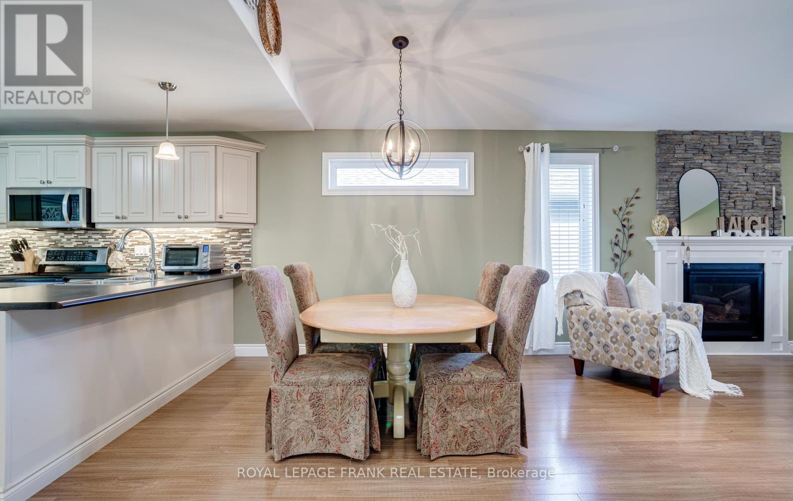 41 Cortland Way, Brighton, ON - Indoor Photo Showing Dining Room With Fireplace