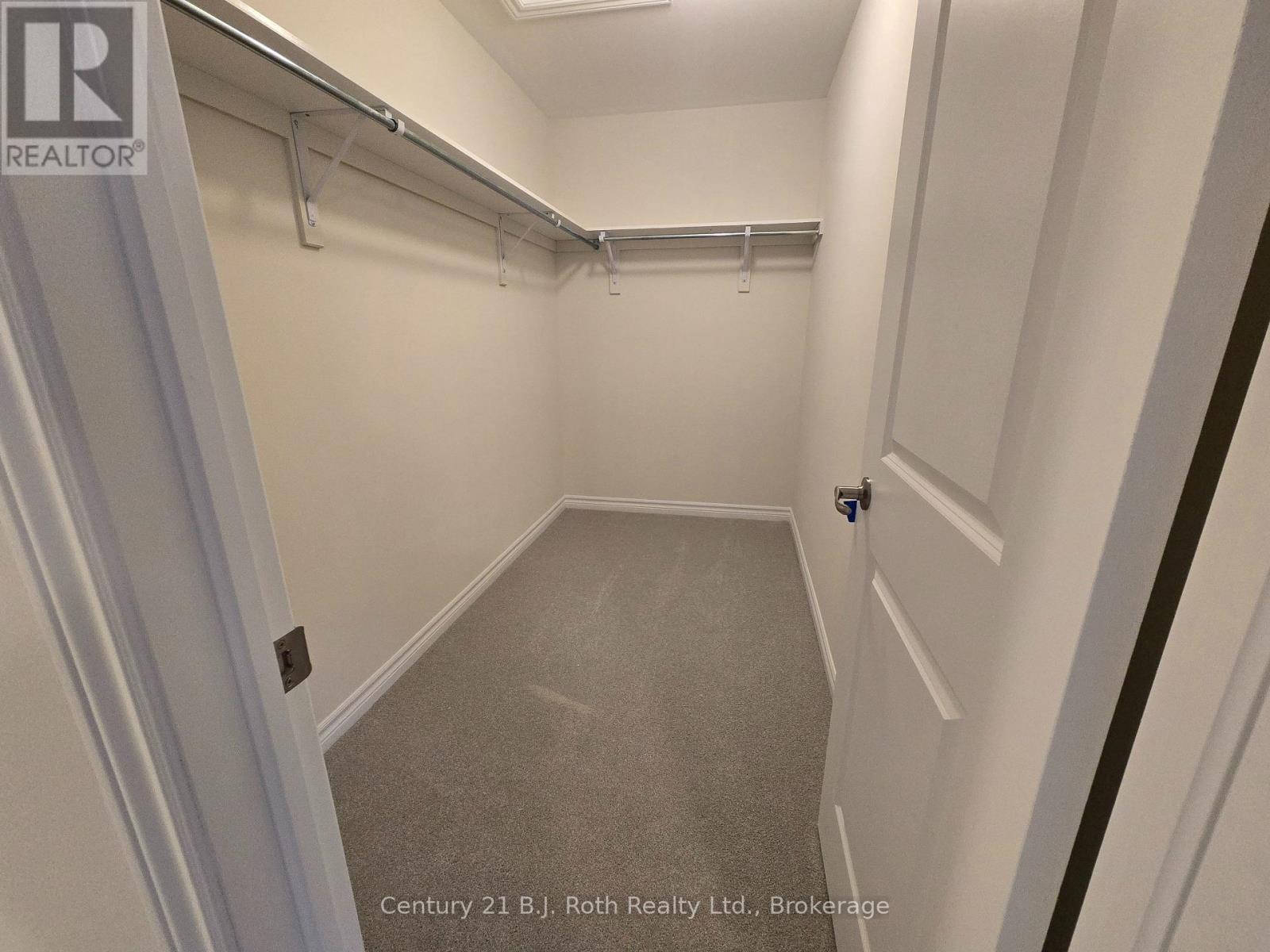 Primary Bedroom Walk-in - 115 Beechwood Forest Lane, Gravenhurst (Muskoka (S)), ON - Indoor With Storage