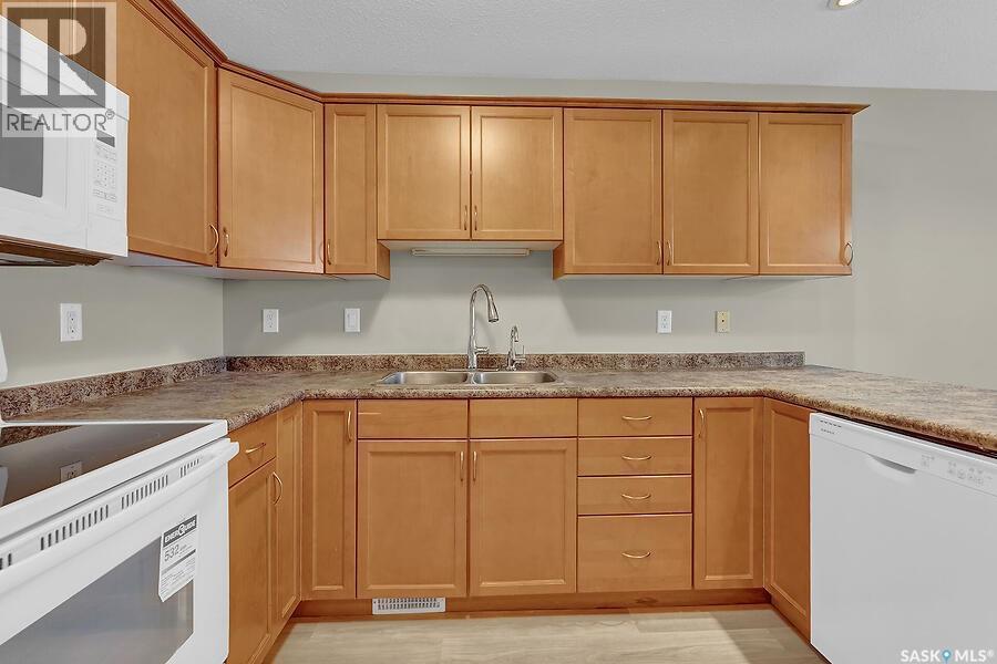 221 South Front Street, Pense, SK - Indoor Photo Showing Kitchen With Double Sink