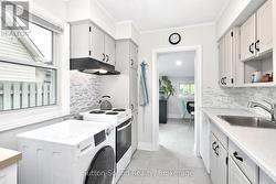 New countertops, sink, and flooring in kitchen -