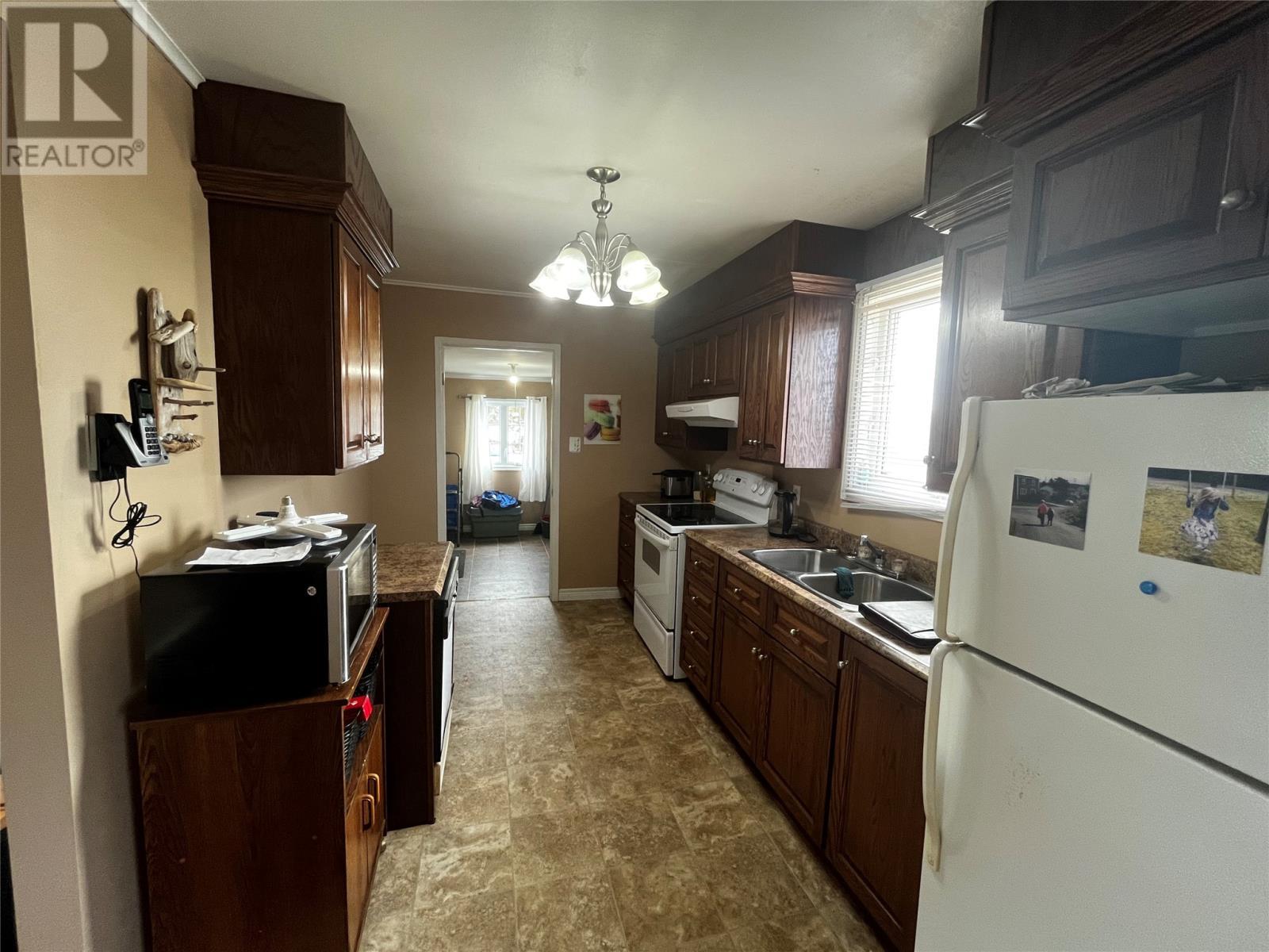 18 Lower Road, Hearts Delight-Islington, NL - Indoor Photo Showing Kitchen With Double Sink