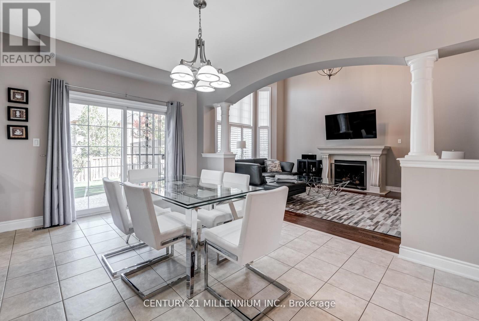 29 Eiffel Boulevard, Brampton, ON - Indoor Photo Showing Dining Room With Fireplace