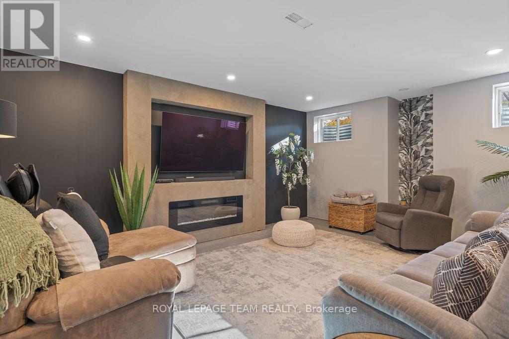 141 Trail Side Circle, Ottawa, ON - Indoor Photo Showing Living Room With Fireplace