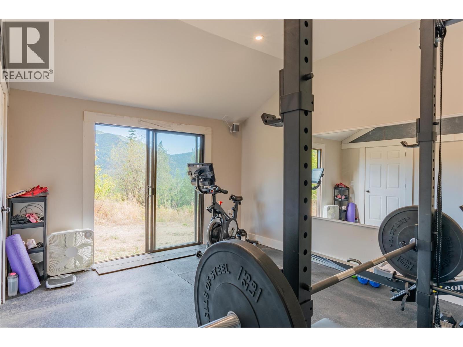 2396 Nault Road, Castlegar, BC - Indoor Photo Showing Gym Room