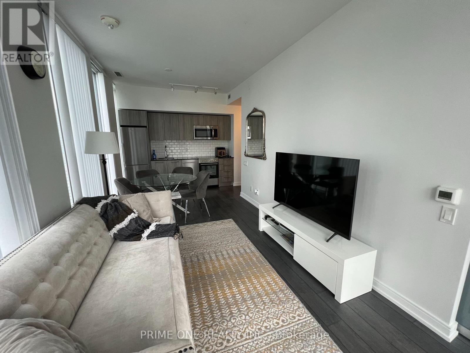 2507 - 28 Wellesley Street E, Toronto, ON - Indoor Photo Showing Living Room