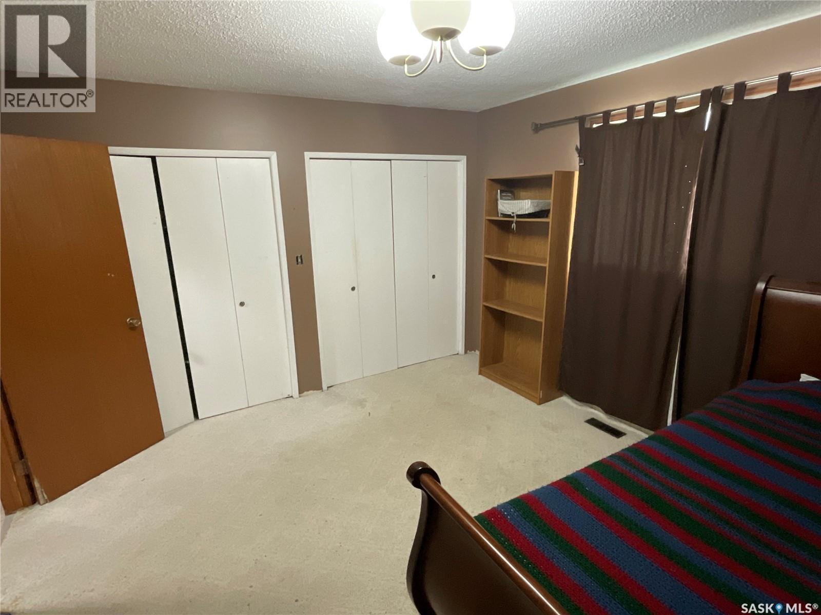 511 6Th Avenue, Cudworth, SK - Indoor Photo Showing Bedroom