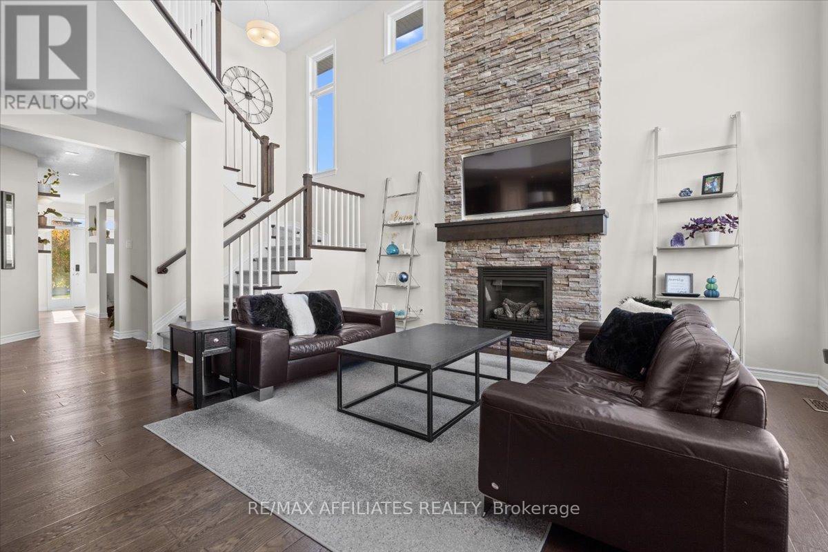 308 Equine Way, Ottawa, ON - Indoor Photo Showing Living Room With Fireplace