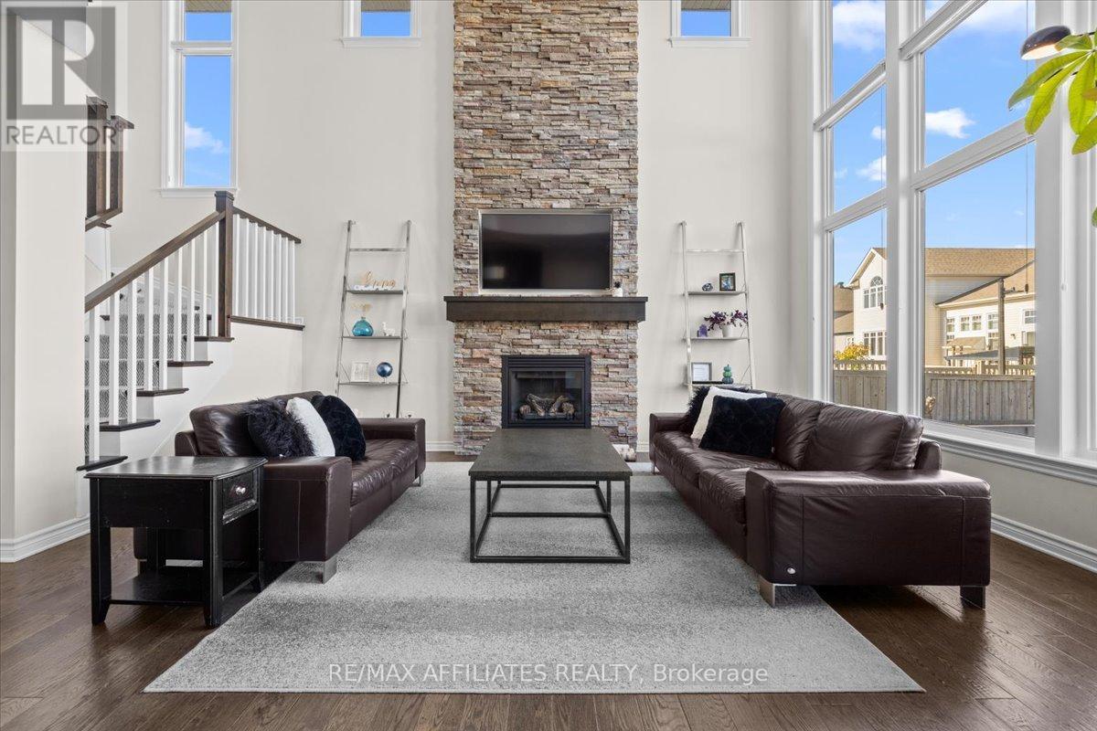 308 Equine Way, Ottawa, ON - Indoor Photo Showing Living Room With Fireplace