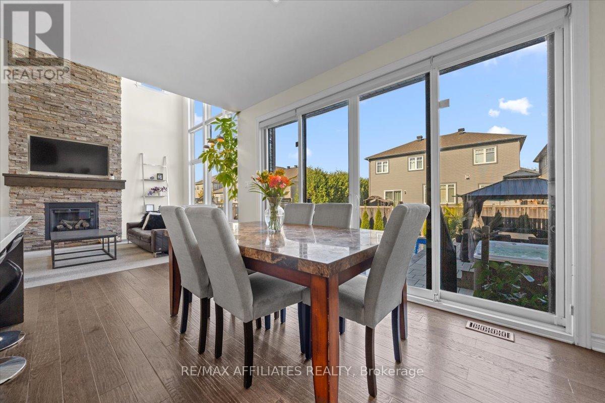 308 Equine Way, Ottawa, ON - Indoor Photo Showing Dining Room With Fireplace