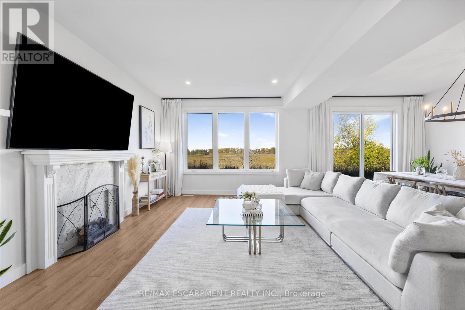 52 Bedrock Drive, Hamilton, ON - Indoor Photo Showing Living Room With Fireplace