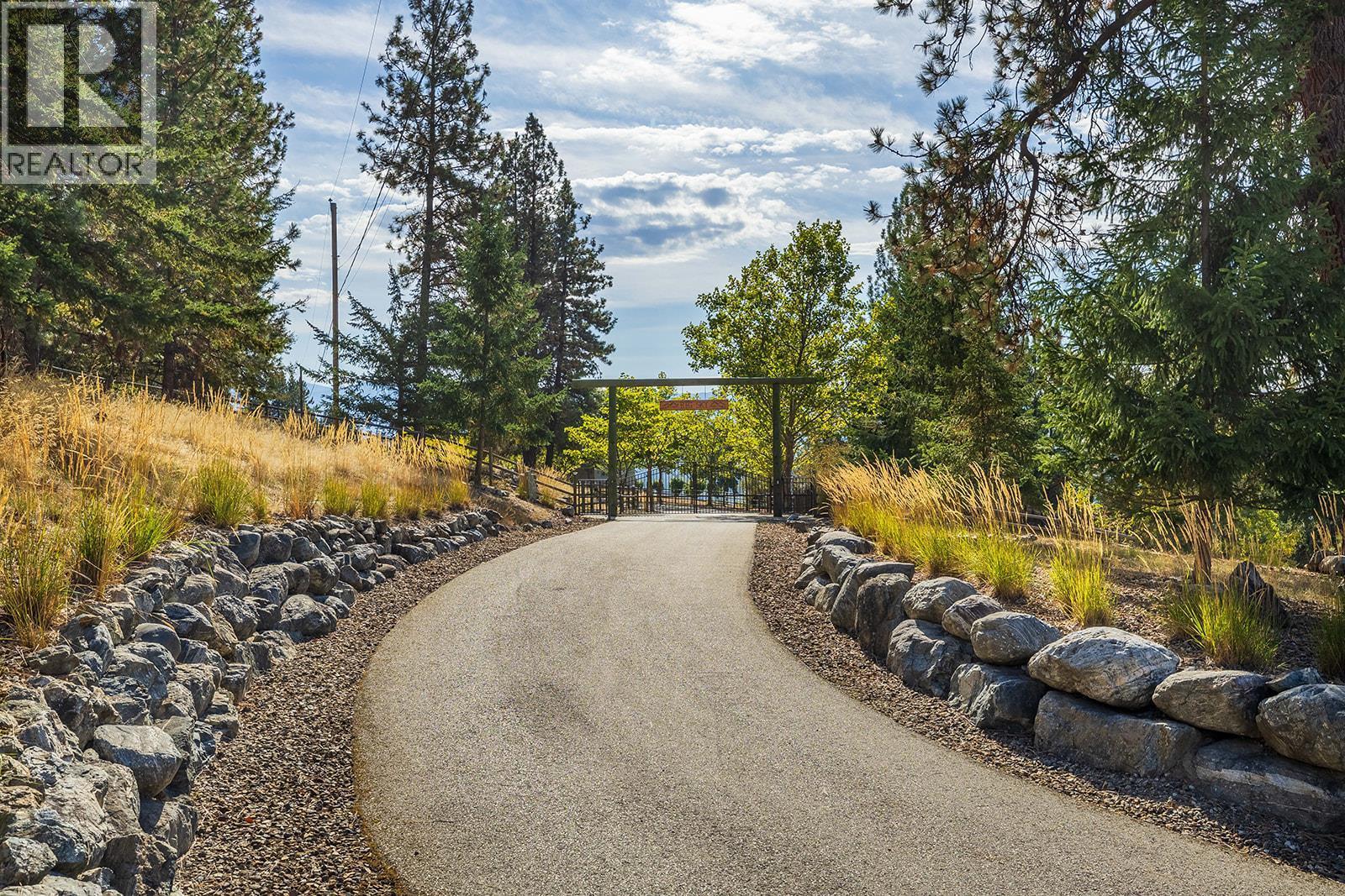 Driveway coming in - 5705 Upper Booth N Road, Kelowna, BC - Outdoor With View