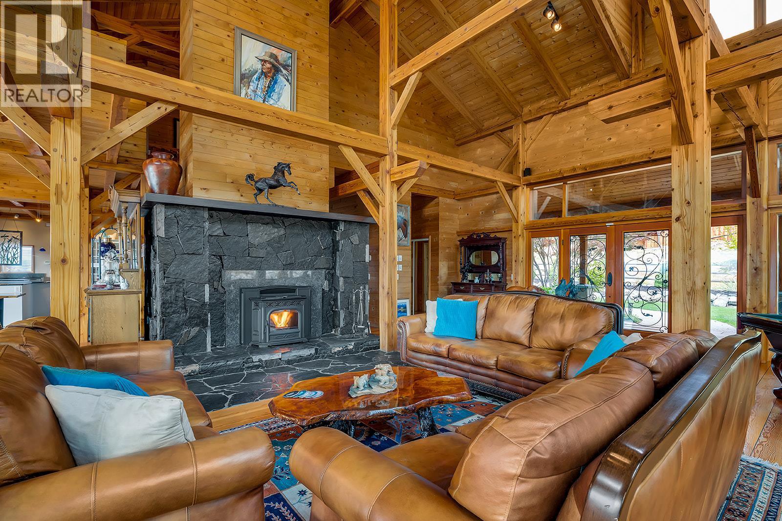 5705 Upper Booth N Road, Kelowna, BC - Indoor Photo Showing Living Room With Fireplace