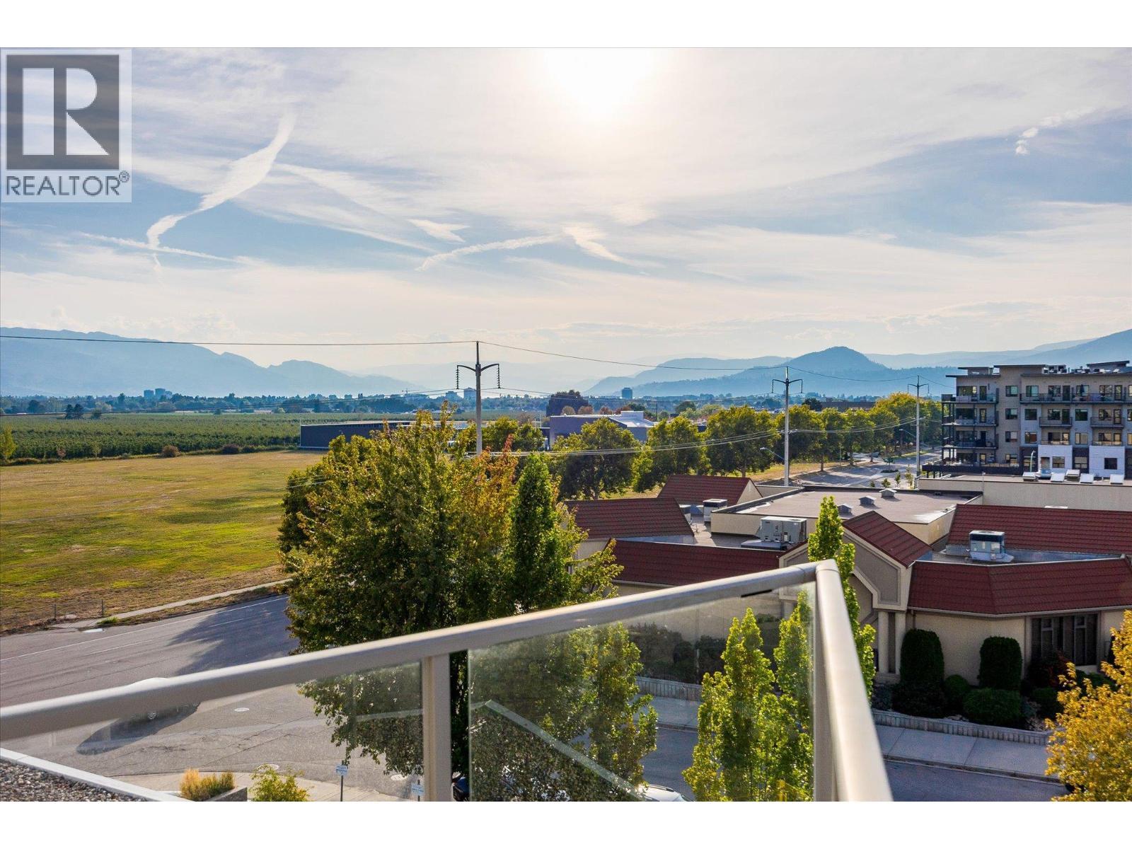 with gorgeous views - 2040 Springfield Road Unit# 401, Kelowna, BC - Outdoor With Balcony With View