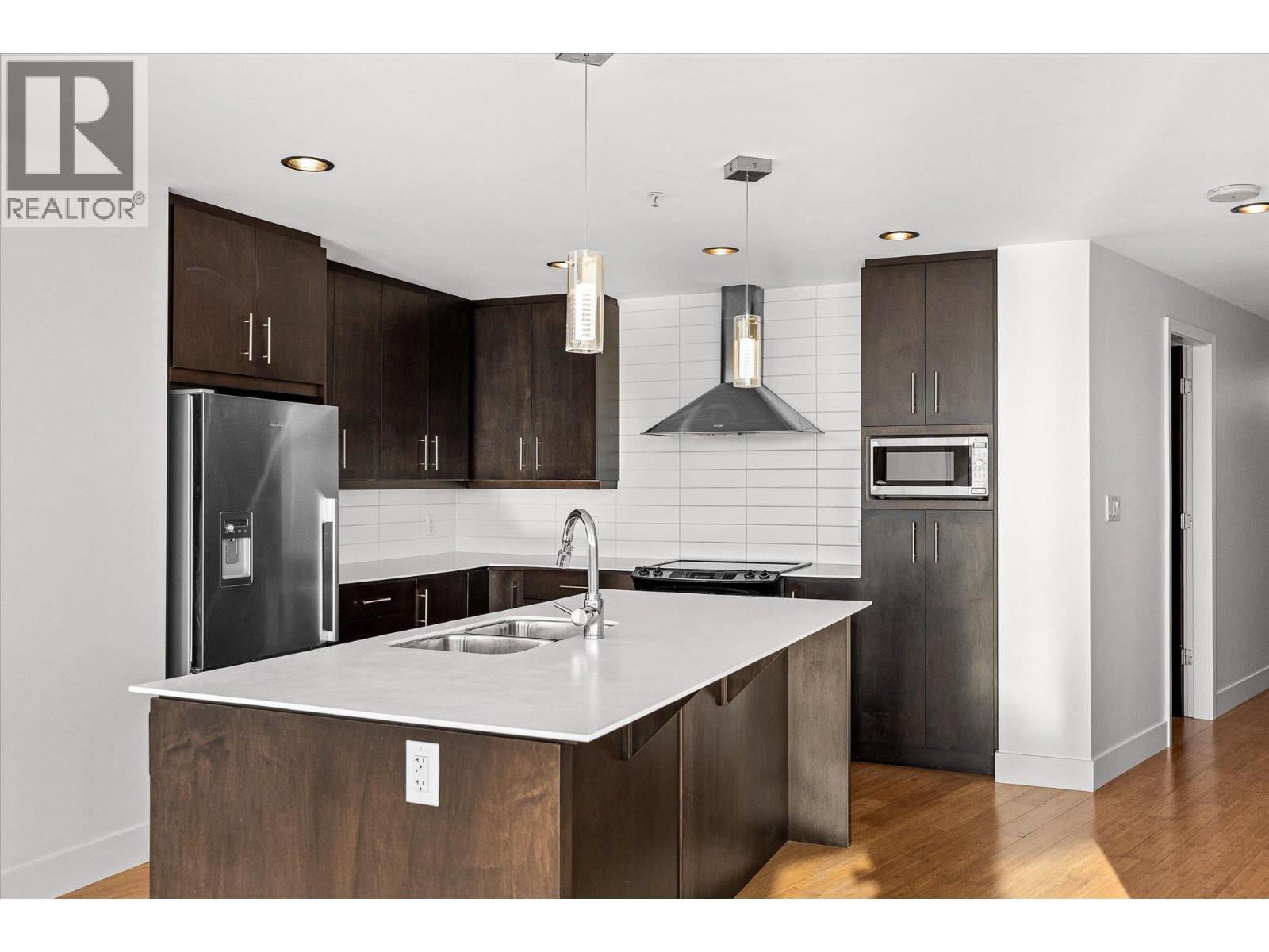 2040 Springfield Road Unit# 401, Kelowna, BC - Indoor Photo Showing Kitchen With Double Sink With Upgraded Kitchen